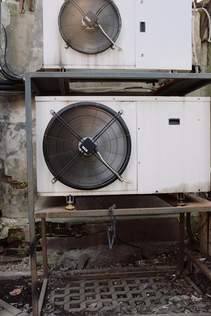 Compressors in white casings running on full power while installed outside of building